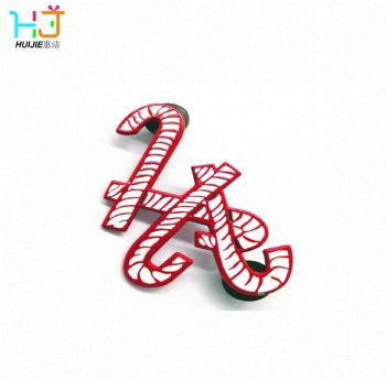 Red and white badges