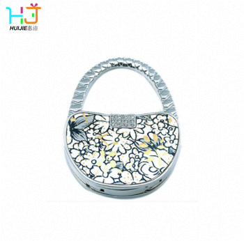 Wallet shaped bag hanger